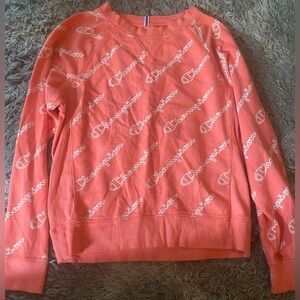 Champion Crewneck sweatshirt women’s size small
Coral with white all over logos